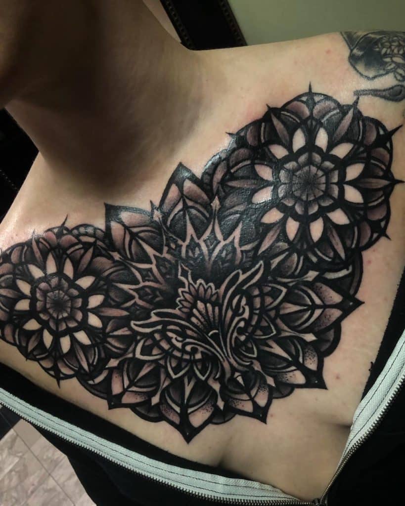 This quality mandala tattoo was done by Christina.