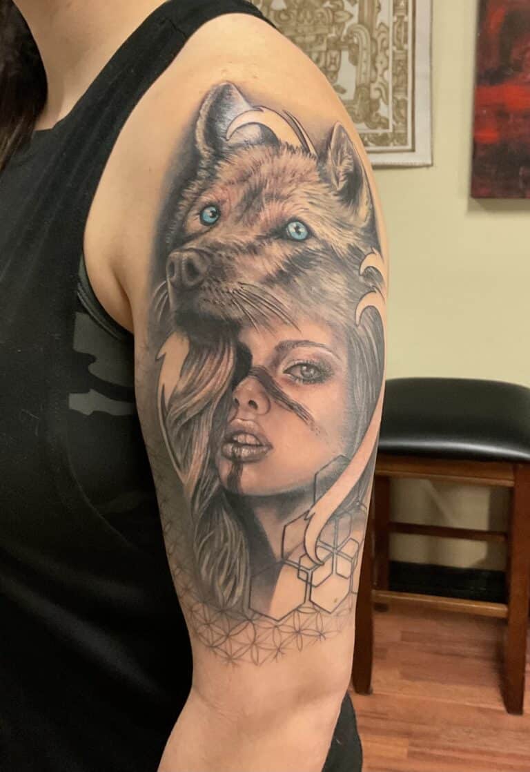 Animal / woman tattoo on the shoulder