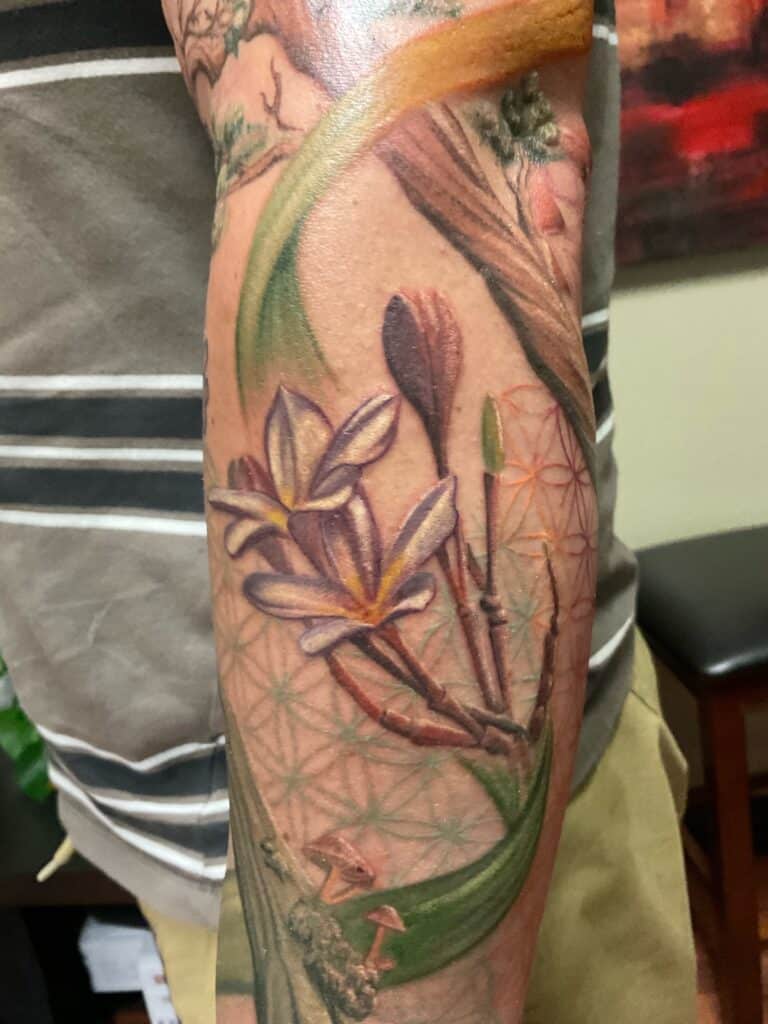 Flower tattoo on the fore arm