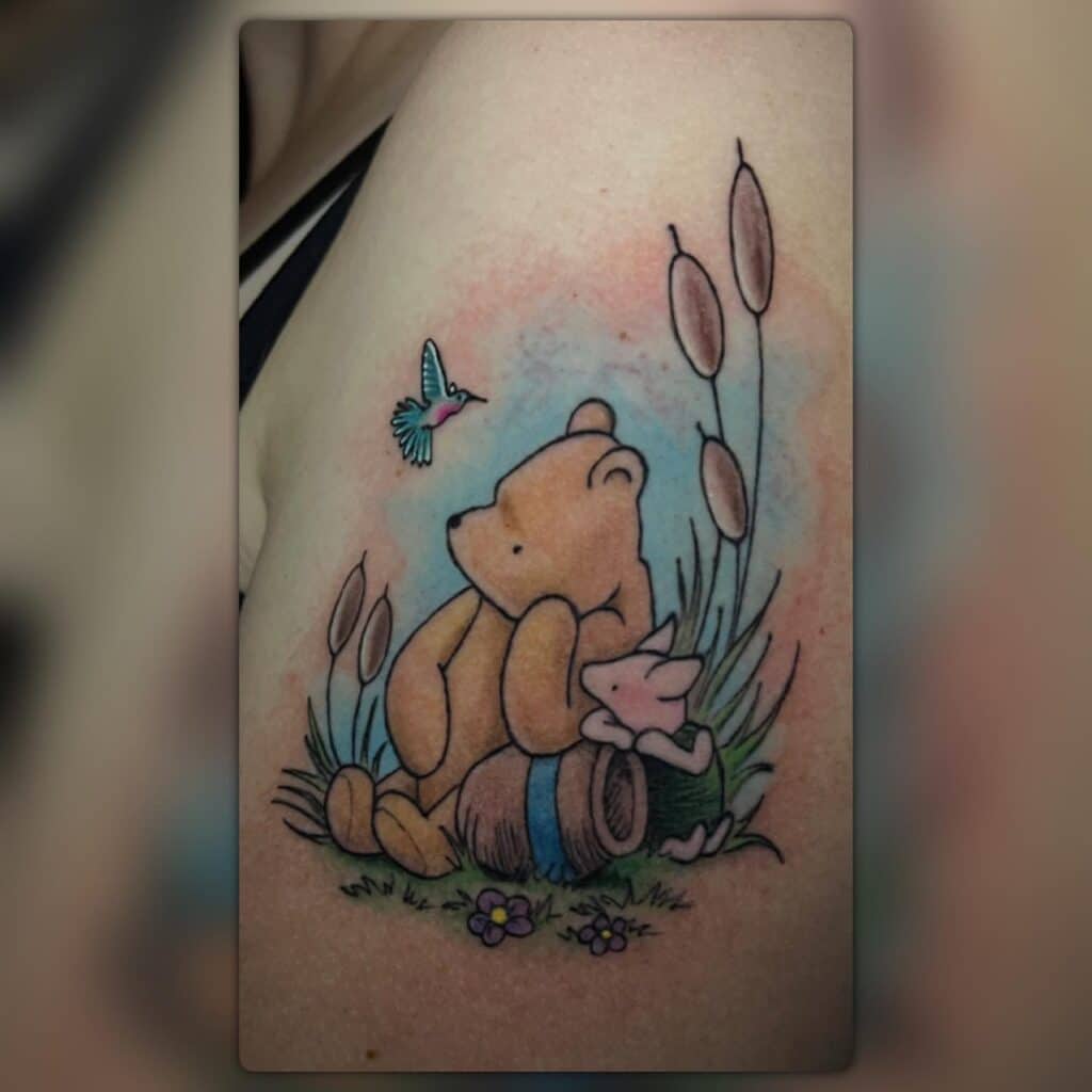 Eeyore tattoo located on the ankle.