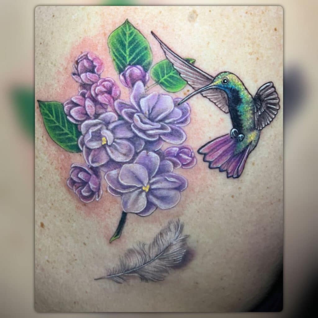 The season of spring is beautifully represented in this hummingbird tattoo by Leah.