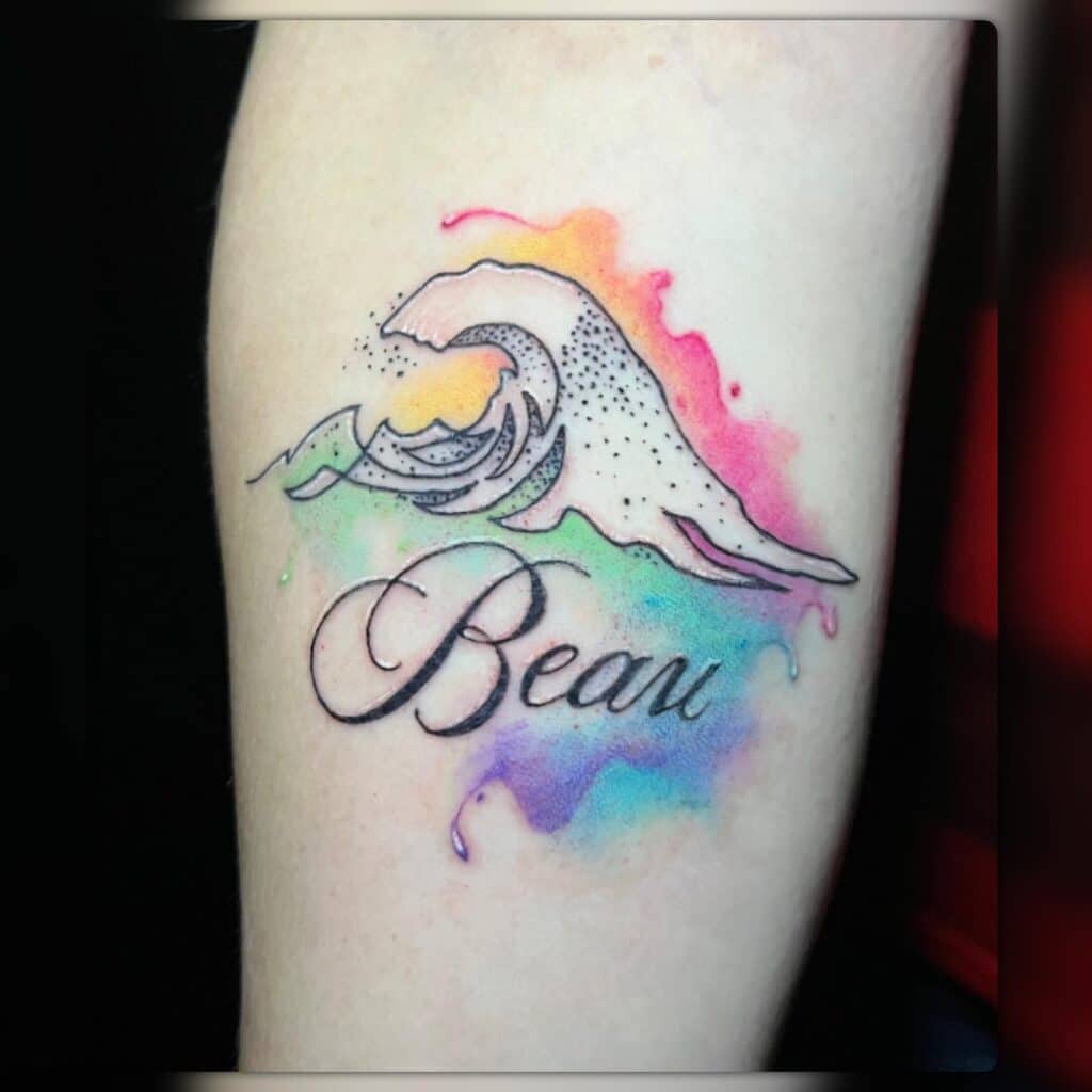 A nice memorial piece, like this wave in water color done by Leah, is a reason a people get tattoos.